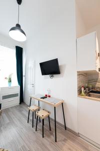 Kuchyňa alebo kuchynka v ubytovaní King Seventeen Homes