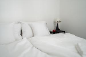 Posteľ alebo postele v izbe v ubytovaní King Seventeen Homes