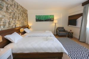 Postel nebo postele na pokoji v ubytování Avwan Hotel Çiğli