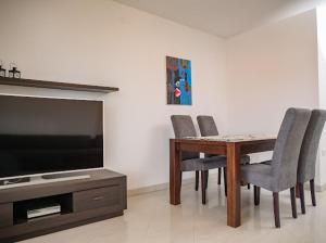TV a/nebo společenská místnost v ubytování Apartments Villa Slavica