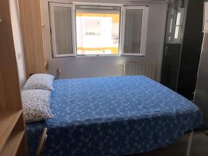 Postel nebo postele na pokoji v ubytování Torredelfino