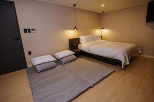 Postel nebo postele na pokoji v ubytování Hotel Pico