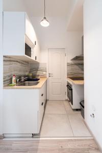 Kuchyňa alebo kuchynka v ubytovaní King Seventeen Homes