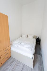 Posteľ alebo postele v izbe v ubytovaní King Seventeen Homes
