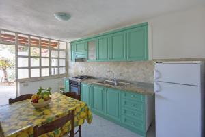 Una cocina o zona de cocina en Appartamenti Casa del Sole