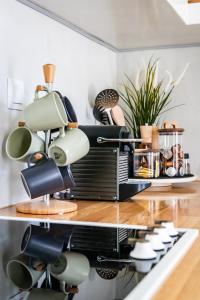 Køkken eller tekøkken på Breezy Rooftop House