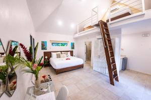 Rúm í herbergi á Aves Hotel Montezuma