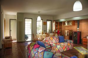 a living room with a couch and a table at La casa di Clelia in Cercola