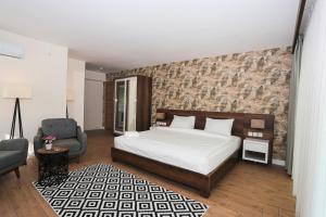 Postel nebo postele na pokoji v ubytování Avwan Hotel Çiğli