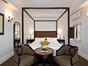 Villa Athena Resort客房内的一张或多张床位