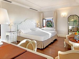 Villa Athena Resort客房内的一张或多张床位