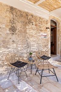 A patio or other outdoor area at Castelvecchio Suites