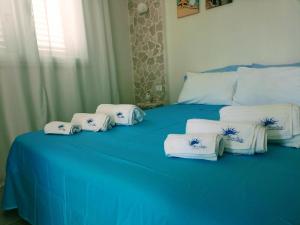 Кровать или кровати в номере BlueSun Apartments