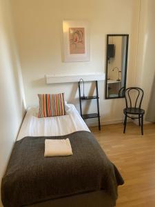 Postel nebo postele na pokoji v ubytování Sidsjö Hotell & Konferens
