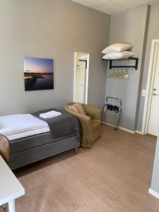 Postel nebo postele na pokoji v ubytování Sidsjö Hotell & Konferens