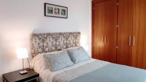 Postel nebo postele na pokoji v ubytování Selecta Elegante Apartamento con Patio en Centro Historico