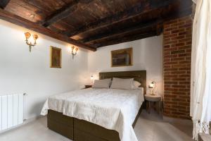 Posteľ alebo postele v izbe v ubytovaní Casa-Pietra Porec