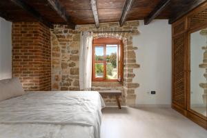 Postel nebo postele na pokoji v ubytování Casa-Pietra Porec