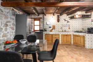 Kuchyňa alebo kuchynka v ubytovaní Casa-Pietra Porec