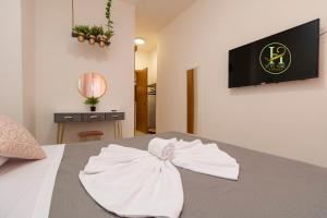 Posteľ alebo postele v izbe v ubytovaní Vitti's Home Verona 3