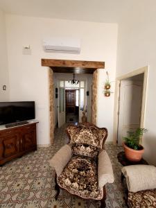 TV a/nebo společenská místnost v ubytování Casa rural La Golondrina