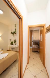 Posteľ alebo postele v izbe v ubytovaní Vitti's Home Verona 3