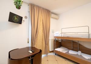 Posteľ alebo postele v izbe v ubytovaní Vitti's Home Verona 3