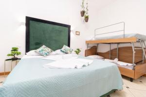 Posteľ alebo postele v izbe v ubytovaní Vitti's Home Verona 3