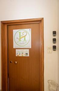 Certifikát, ocenenie alebo iný dokument vystavený v ubytovaní Vitti's Home Verona 3