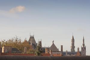 a view of a city with many tall buildings at B&B In Bruges in Bruges