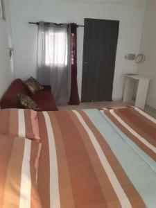 Postel nebo postele na pokoji v ubytování Adorable monoambiente en Asunción