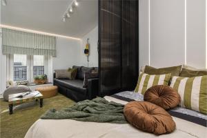 Posteľ alebo postele v izbe v ubytovaní West Side Piotrkowska Apartment