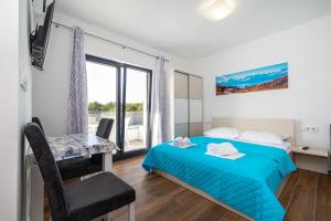 Postel nebo postele na pokoji v ubytování Villa Laura View