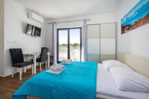 Postel nebo postele na pokoji v ubytování Villa Laura View