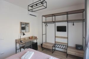 A bed or beds in a room at AnGiò holiday rooms