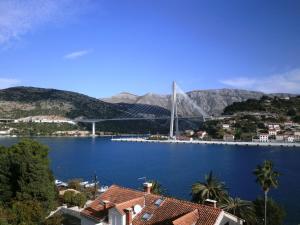 a view of a bridge over a large body of water at Apartments Villa Sirena in Dubrovnik