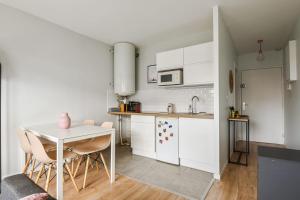 Kuchyňa alebo kuchynka v ubytovaní Appartement Gossolet - Welkeys