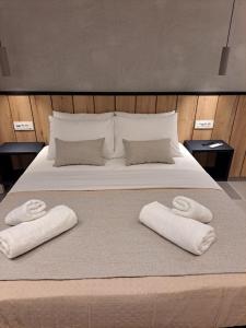 Postel nebo postele na pokoji v ubytování Pleasant Stay