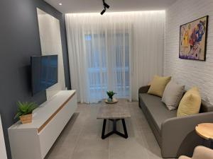 Posezení v ubytování Pleasant Stay