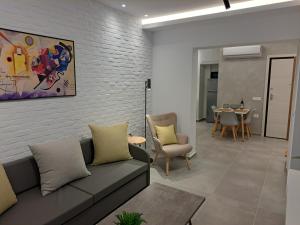 Posezení v ubytování Pleasant Stay