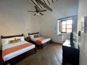 Letto o letti in una camera di Hotel Boutique Posada Las Trampas