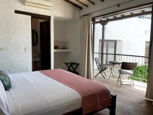 Letto o letti in una camera di Hotel Boutique Posada Las Trampas