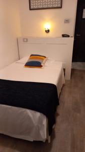 Łóżko lub łóżka w pokoju w obiekcie LH Hotel Excel Roma Montemario