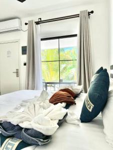 Postel nebo postele na pokoji v ubytování Belvedere Thoddoo