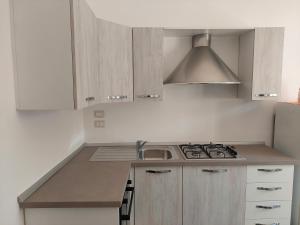 A kitchen or kitchenette at Casa Vacanze Lu Trappitu