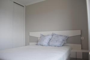 Postel nebo postele na pokoji v ubytování MARAVILLOSO APARTAMENTO VILANOVA DE AROUSA