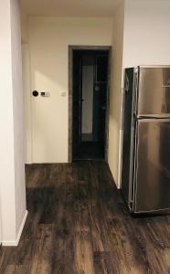 Kuchyň nebo kuchyňský kout v ubytování Apartman u lesa