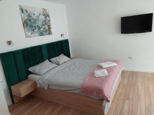 Cama o camas de una habitación en Ela's apartment