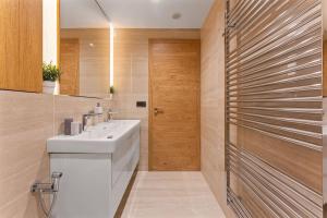 Koupelna v ubytování Residence Koubek - Útulný apartmán s výhledem a parkováním