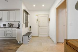 Kuchyňa alebo kuchynka v ubytovaní Appartement Mésangia - Welkeys + 5 fotografií